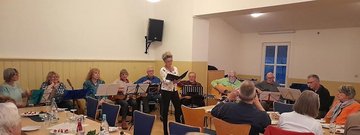 Musikgruppe mit Henning Jäcke